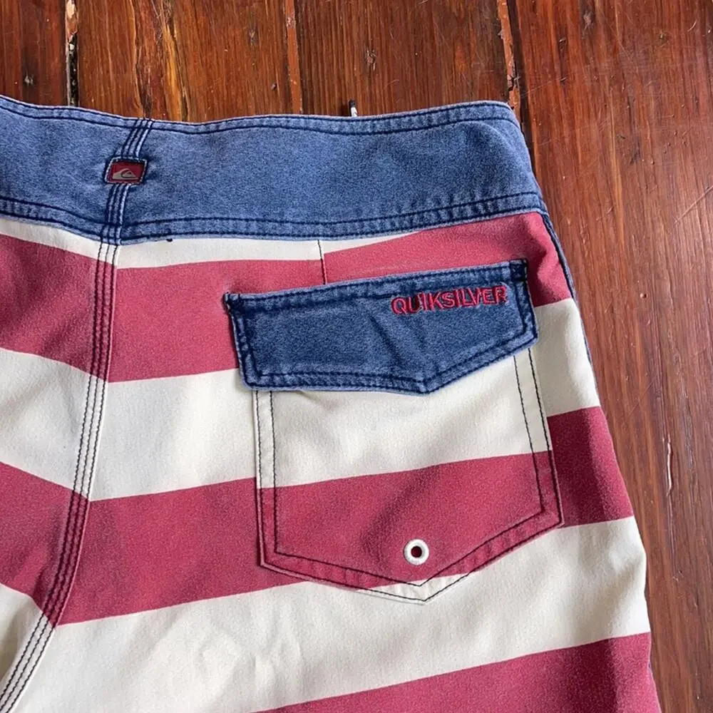 Quiksilver red white and blue striped unlined board shorts sz 28